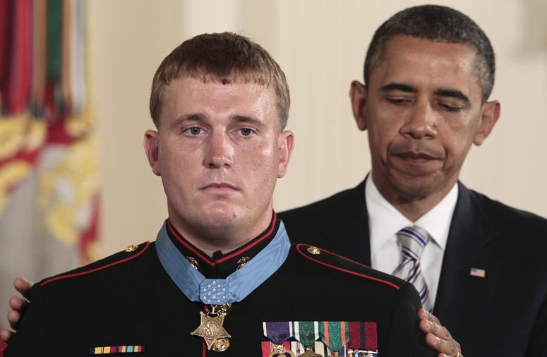 President Barack Obama awards the Medal of Honor to former Marine Corps Cpl. Dakota Meyers, 23, from Greensburg, Ky., today during a ceremony in the East Room of the White House.