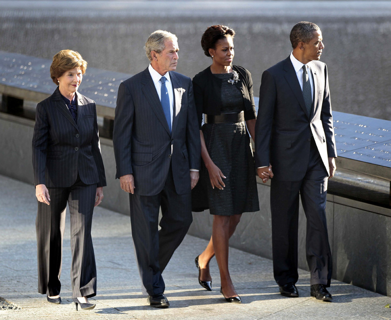 President Barack Obama and first lady Michelle Obama and former President George W. Bush and former first lady Laura Bush visit North Memorial Pond at the National Sept. 11th Memorial today.