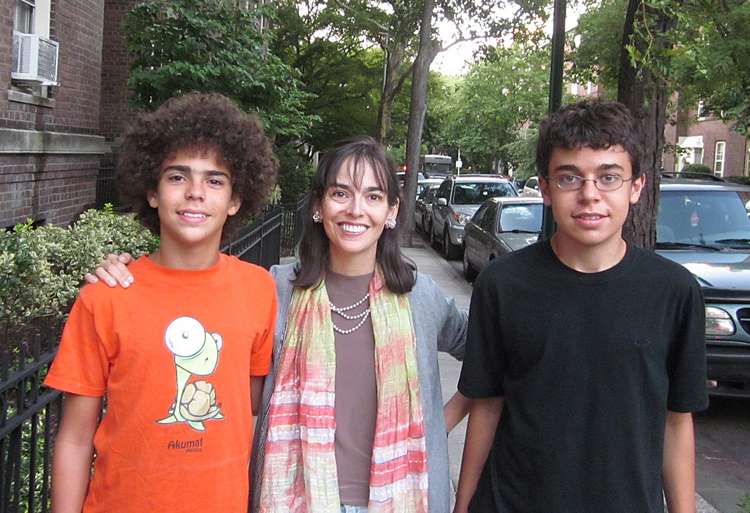 This photo provided by the family shows Lenore Skenazy, center, with her sons Izzy, 13, left, and Morry, 15, outside their apartment building in Queens. Skenazy wrote a book called "Free Range Kids: How To Raise Safe, Self-Reliant Children (Without Going Nuts with Worry)." She contends that many marketers exploit parents' ingrained worries about their children's safety. "The idea is that the only good parent is a parent who is somehow watching over their child 24/7," she said.