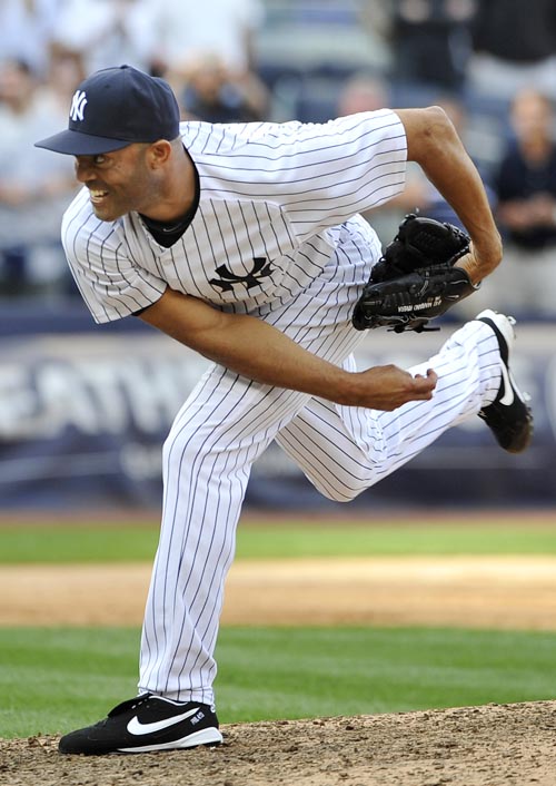 Mariano Rivera pitches in the ninth inning on Monday at Yankee Stadium in New York.