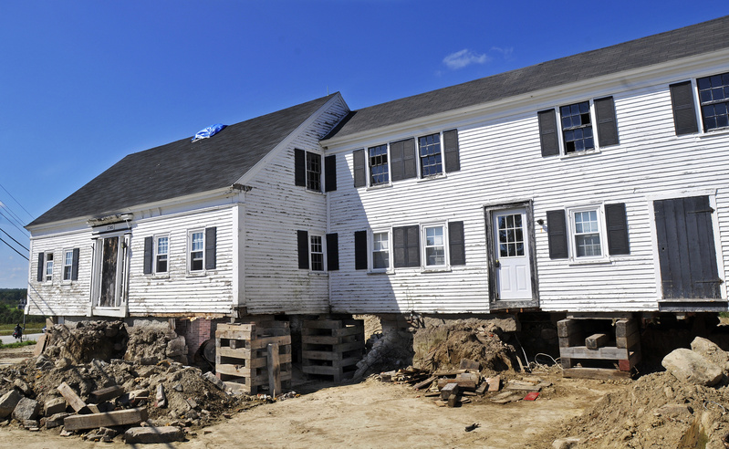 The Burnham farmhouse on Route 111 in Arundel, built in 1795, is one of two farmhouses that are being raised from their foundations and moved by the Arundel Historical Society.