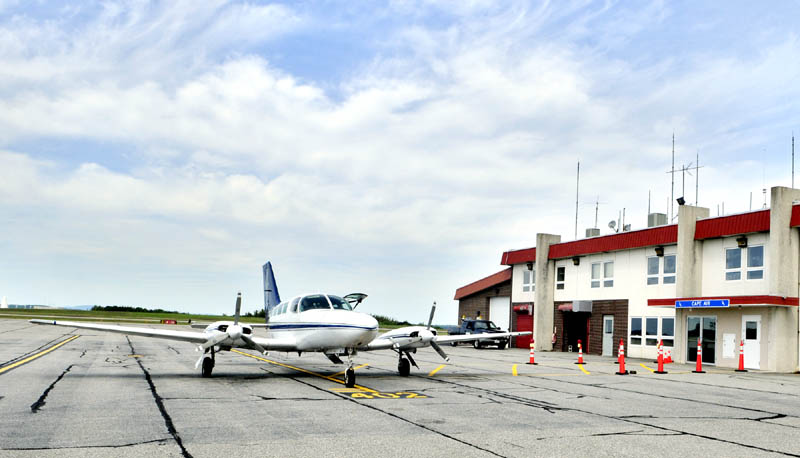 A Cape Air plane sits in front of the Augusta State Airport. The airline may pick up the federally subsidized service to several other Maine communities that Colgan Air intends to drop.