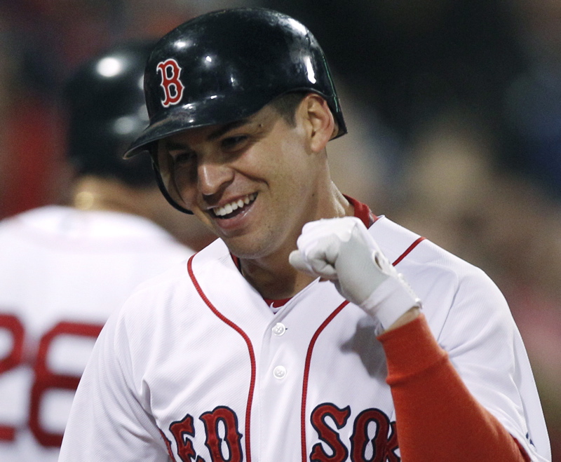 Jacoby Ellsbury pumps his fist after scoring on his inside-the-park home run in the seventh inning against the Orioles tonight during the second game of a doubleheader at Fenway Park. The Red Sox won the second game after a 6-5 loss in the opener.