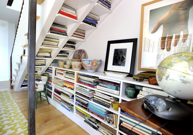 ... and clever under-the-stairs bookshelves.