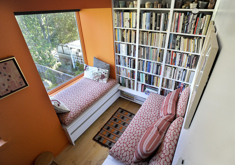 Among the features added when Portland architectural designer Jeremy Moser tackled the renovation are a cool second-floor book nook/guest sleeping space ...