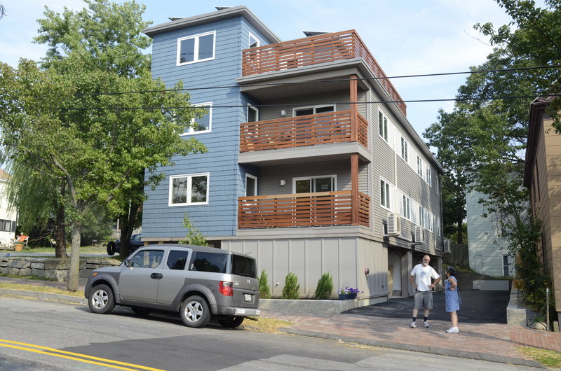 The energy efficient house that Paul Ledman and Colleen Myers built on Munjoy Hill fits into the neighborhood, but it has heat pumps, heat recovery ventilators, photovoltaic panels and more.