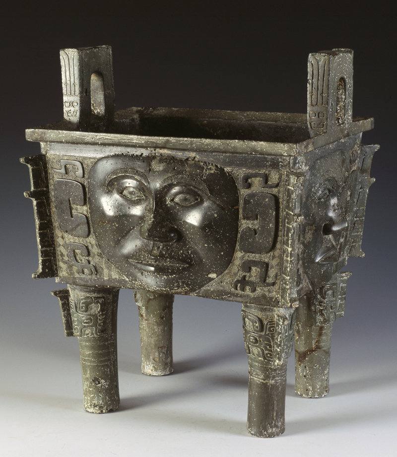 One of the pieces in the "Along the Yangzi River" show at Bowdoin is this rectangular ding (used for cooking meat) with a human face design.