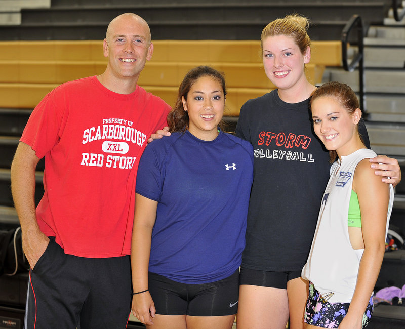 Scarborough Coach Jon Roberts, along with senior captains Amber Bover, left, Brittany Bona, center, and Emily Robbins, intends to take a run at a state title this fall.