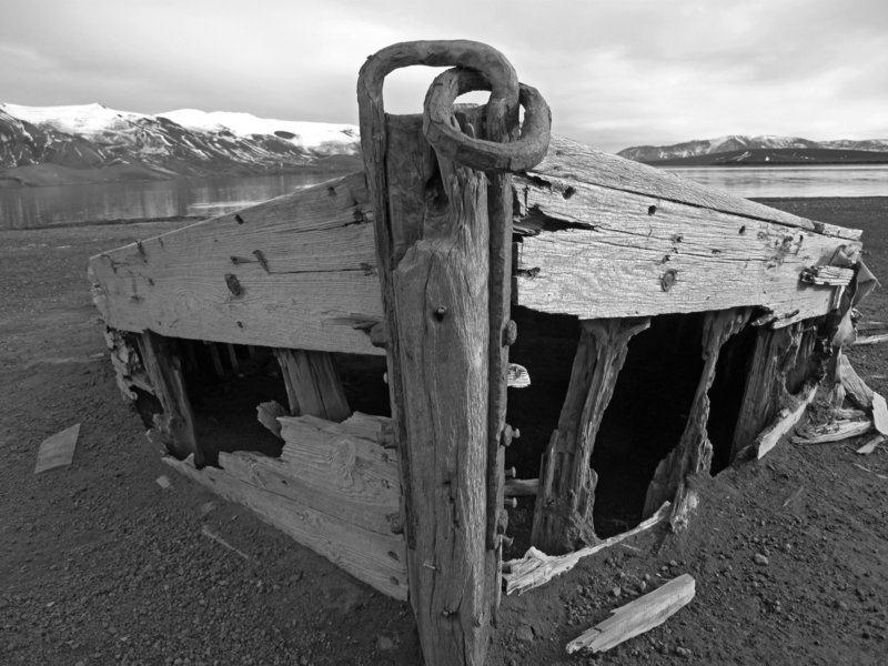 John Hidgon’s photograph “Whaling Boat Skeleton” captures the end of the line.