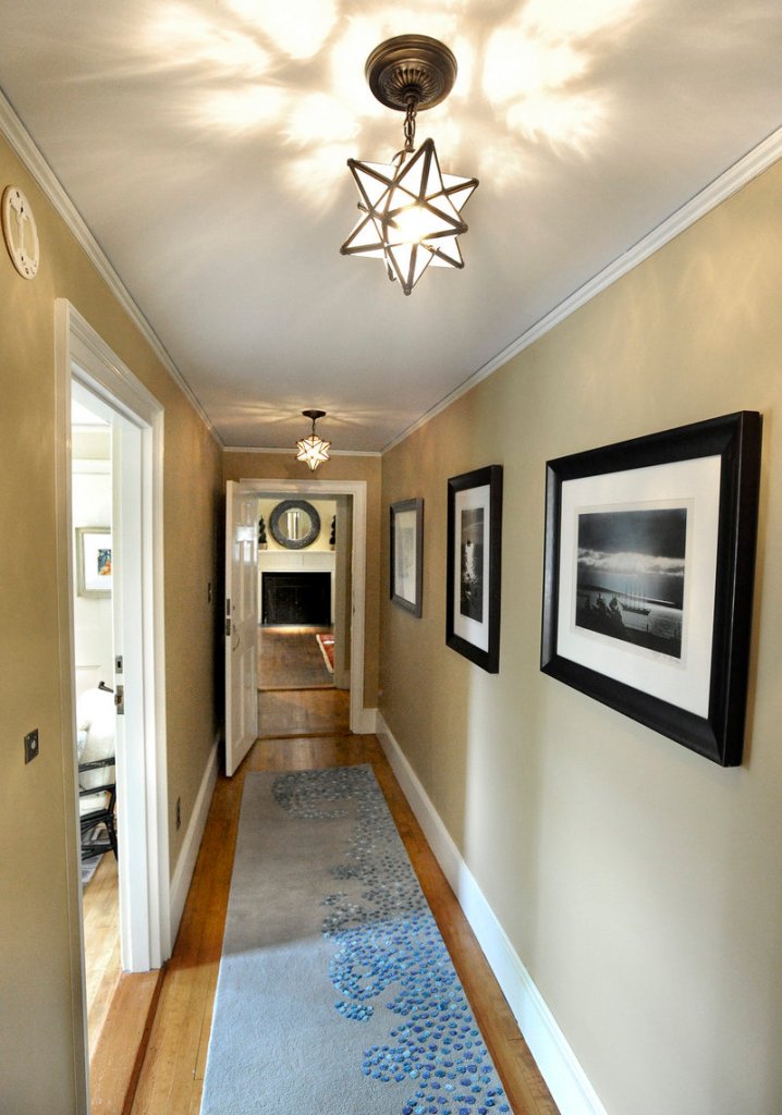 The interior design for this second-floor hallway was done by Vanessa Helmick of Fiore Interiors.