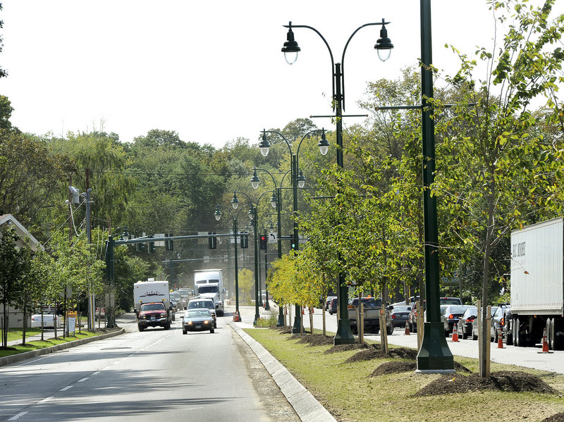 The landscaped median constructed this summer, complete with street lamps, is part of the improvement project for William L. Clarke Drive, the 1960s bypass around downtown Westbrook. The project includes reconfiguring intersections and coordinating traffic lights.