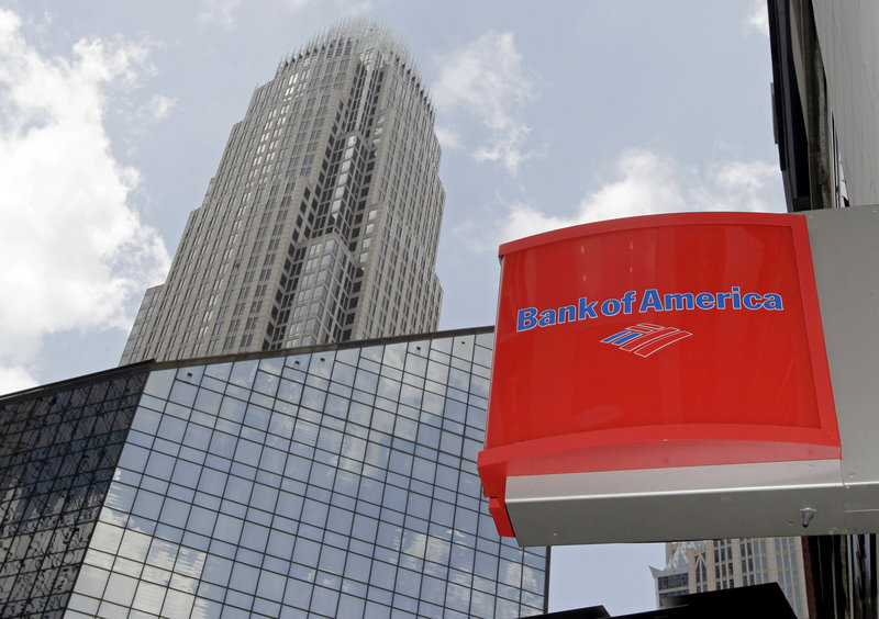 Bank of America’s headquarters are shown in Charlotte, N.C. It is among 17 institutions the U.S. government is suing, contending they violated federal and state laws in the sale of home mortgage-backed securities.
