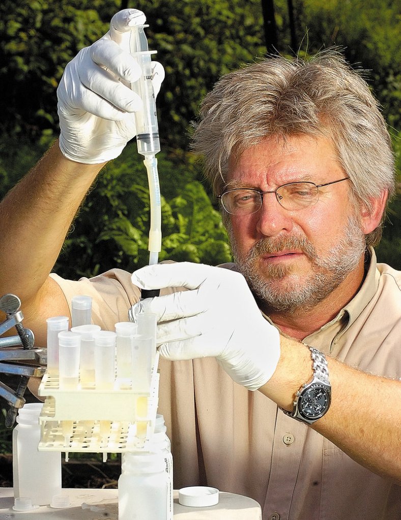 Charles Culbertson, a scientist with the U.S. Geological Survey-Maine Water Science Center, demonstrates some of the equipment that he uses to test well water.
