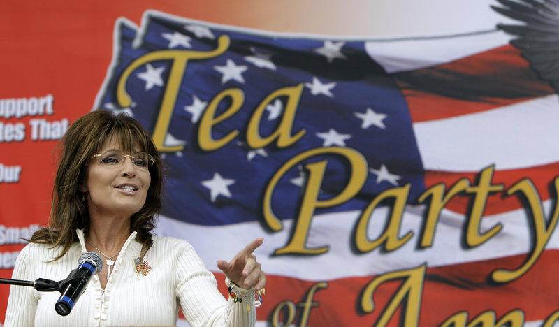 Former Alaska Gov. Sarah Palin speaks at a tea party rally Saturday in Indianola, Iowa, where she was greeted with cries of “Run, Sarah, run.”