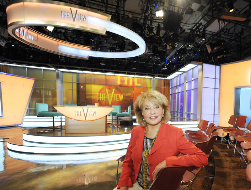 Barbara Walters poses on the new set of the daytime talk show “The View,” which starts its 15th season Tuesday.