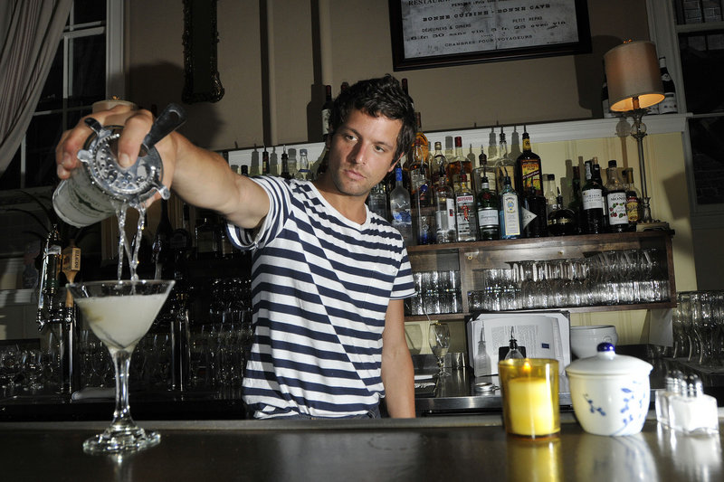 Joshua Loring, a bartender at Petite Jacqueline in Portland, pours a Flaneur, made with Bombay Sapphire gin, "slightly dirty," with dilly beans.