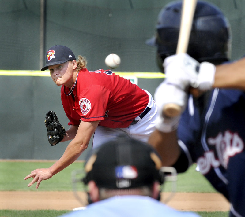 Portland's Will Latimer delivers a pitch against the New Hampshire Fisher Cats on Monday during the Sea Dogs season finale at Hadlock Field.
