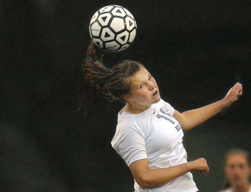 Ashley Frank of Portland keeps her concentration and heads the ball upfield Wednesday during the Western Class A schoolgirl soccer game against Noble at Fitzpatrick Stadium. Noble scored early and earned a 1-0 victory.