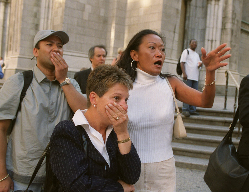 New Yorkers react to the destruction of the World Trade Center on Sept. 11, 2001.