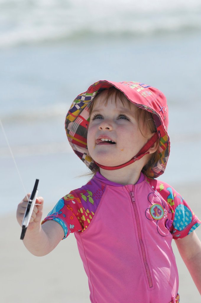 Eleonore Pepin, 2, of Quebec keeps a close eye on her kite.