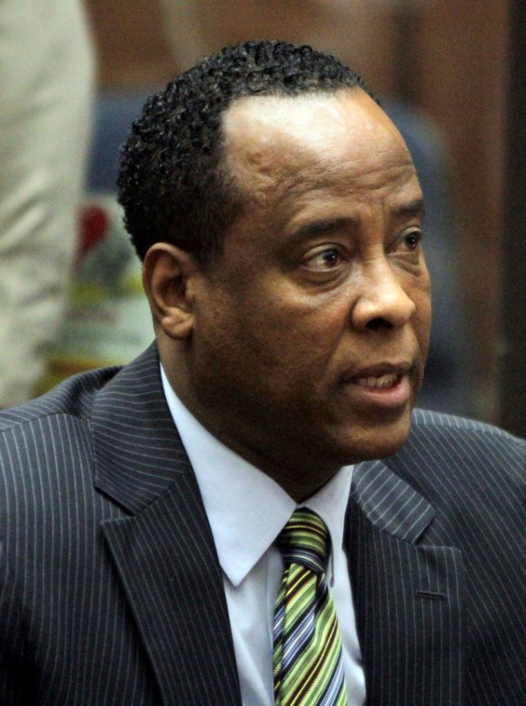 Dr. Conrad Murray, above, of Houston is charged with involuntary manslaughter in the 2009 overdose death of pop star Michael Jackson, below.