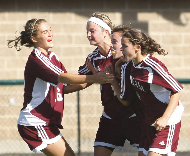 Libby Andreasen, left, celebrates with, left to right, Kiersten Turner, Kali St. Germain and Erin Smith after St. Germain scored the first-half goal that gave Gorham a 1-0 victory against Scarborough.
