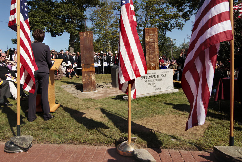 U.S. Sen. Susan Collins, R-Maine, left, speaks during the dedication of a monument, which is made of steel salvaged from the twin towers, in Freeport on Sunday.