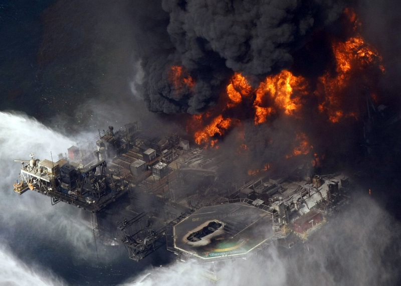 The Deepwater Horizon oil rig is engulfed in flames in this April 21, 2010, photo taken in the Gulf of Mexico. A governmental panel found Wednesday that BP was not the only entity at fault for the worst offshore oil spill in U.S. history, but bore most of the blame for its faulty decisions during the disaster and its lack of attention to safety before the blowout occurred.
