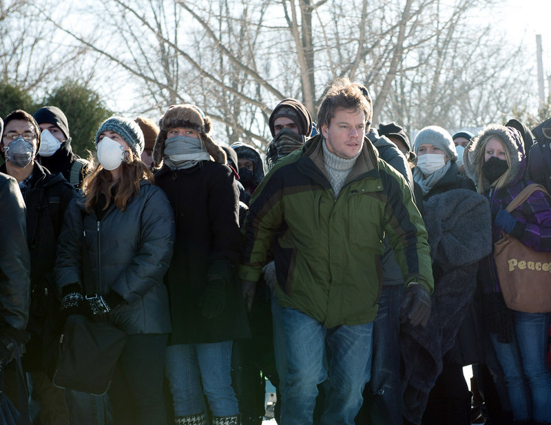Matt Damon appears in a scene from the film “Contagion,” getting by without a surgical mask because he’s one of the lucky ones immune from a deadly virus. Real-life disease investigators hope the movie will cause the public to think about and plan for contagious global diseases and the calamities that could follow.