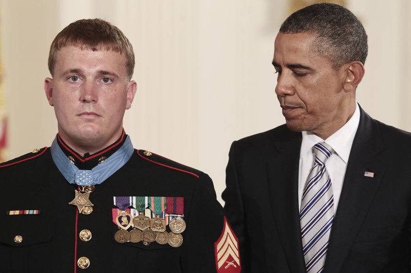 President Obama awards the Medal of Honor to former Marine Corps Cpl. Dakota Meyer, 23, of Greensburg, Ky., Thursday during a ceremony in the East Room of the White House.