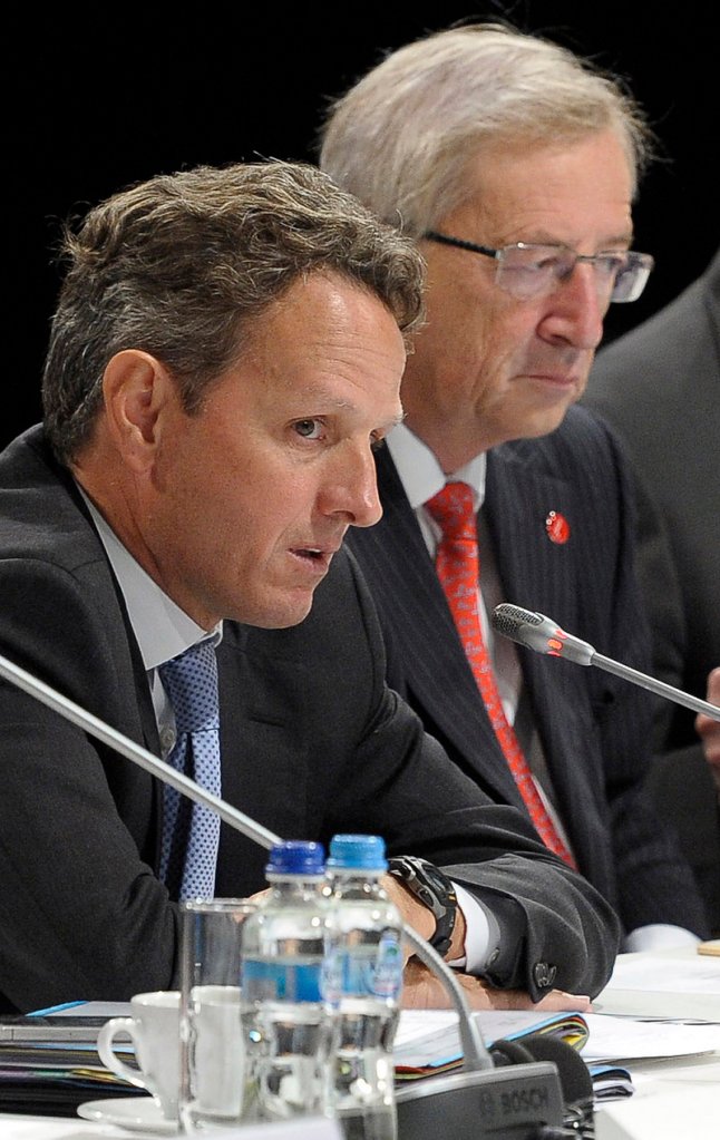 U.S. Treasury Secretary Timothy Geithner and Eurogroup President Jean-Claude Juncker