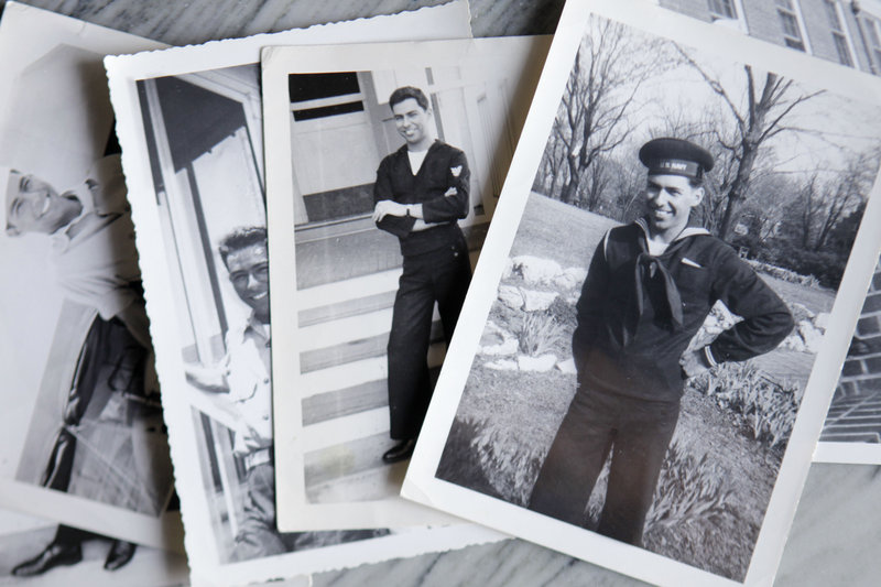 Photographs of Melvin Dwork, taken in 1943 when he was in the Navy, are on display at his home. The former corpsman now will be eligible for medical care and a military burial.
