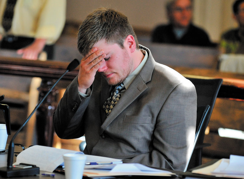 Ryan Ouimet reacts as family members recount the life and loss of Andrew Holland during sentencing at the Franklin County Superior Court in Farmington Friday.