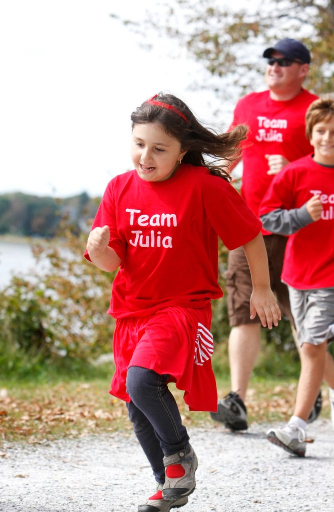 Team Julia’s star, Julia Habib, 7, of Augusta, who has Type 1 diabetes, takes off around Back Cove with cousin John Owen Habib, 9, of Rhode Island and her uncle Jared Mills of Augusta not far behind during the Walk to Cure Diabetes.