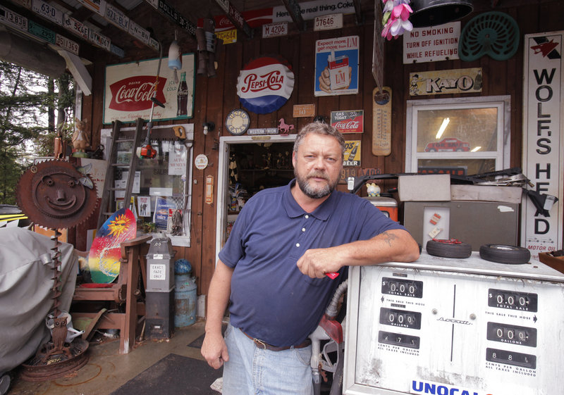 Mario Binette, operator of Champion Auto in Arundel, used to collect old motorcycles and bicycles, but now he’s focused more on antique toys, signs and gas-station memorabilia.