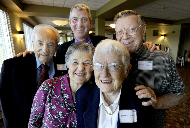 Dr. Kenneth Myers, back center, honors Monty and Eleanor Small of Portland and Barbara and Ernest Etzweiler of Topsham, and 56 other members of his “80/20 Club,” with a dinner at the Falmouth Country Club on Friday. “I want to celebrate the fact that they’ve accomplished what I want as a dentist: all their teeth for their whole life,” he said.