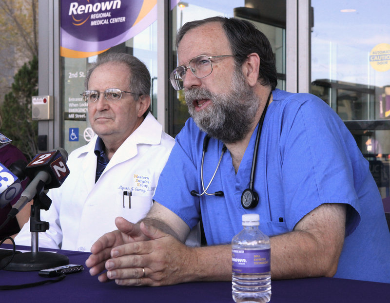 Dr. Mike Morkin, chief emergency room surgeon at Renown Regional Medical Center in Reno, Nev., shown speaking at a news conference on Sept. 17, is among those credited with saving the lives of many of those injured in the crash at an air show this month.