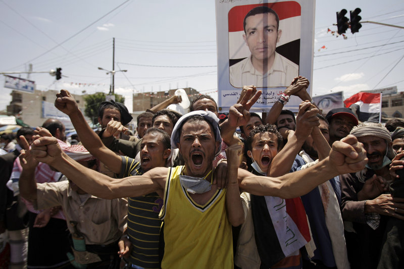 Protesters demand the resignation of Yemeni President Ali Abdullah Saleh, in Sanaa, Yemen, on Saturday.