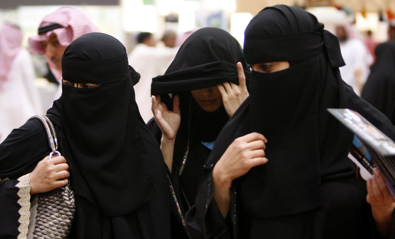 Saudi women visit the Saudi Travel and Tourism Investment Market fair in Riyadh. King Abdullah has given women the right to vote for the first time in local elections.