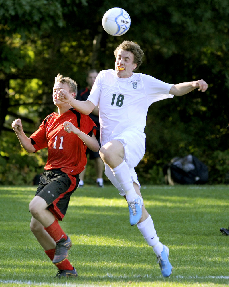 William Cleaves, right, of Waynflete makes a play on the ball in front of Wells' Tommy Cryer during Waynflete's 9-1 victory in Portland on Monday.
