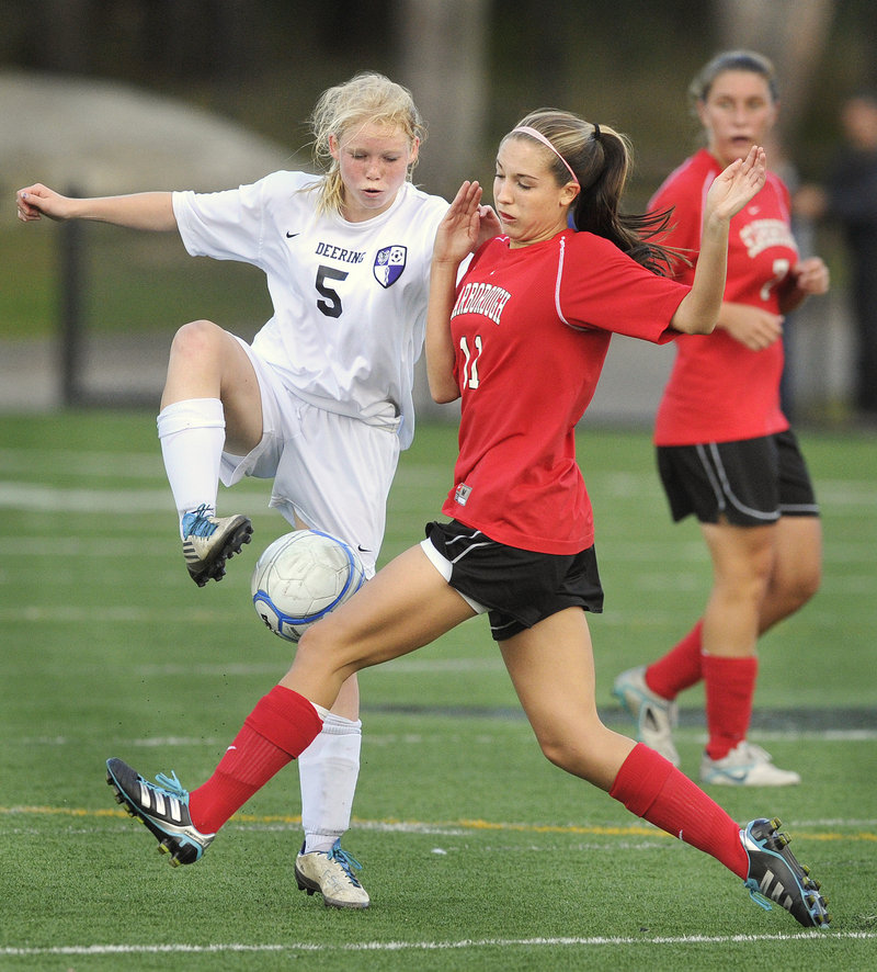 Meaghan Wells of Deering, left, competes with Taylor Leborgne of Scarborough in the first half of Scarborough s 3-2 victory. Scarborough (5-1-2) has a six-game unbeaten streak.