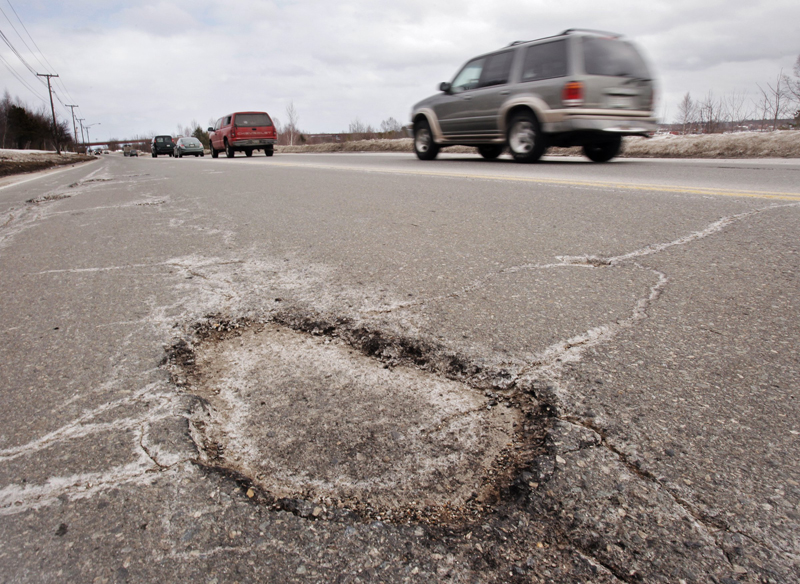 This pothole could be found on Commercial Street in Portland last spring. The Maine Better Transportation Association will soon announce its "winner" of the worst-road contest.