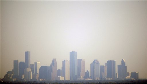 Smog in downtown Houston on Oct. 2, 2008. President Obama has put draft ozone regulations proposed by the Environmental Protection Agency on hold until 2013.