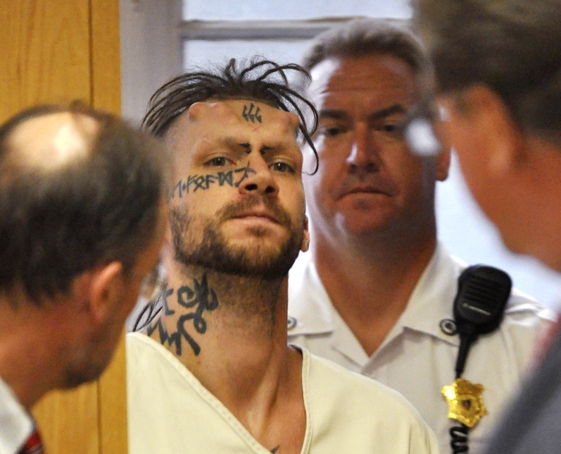 Caius Domitius Veiovis appears at his arraignment Monday in Berkshire District Court in Pittsfield, Mass. In 2000, he was convicted in a Maine case that involved cutting a 16-year-old girl's back open.