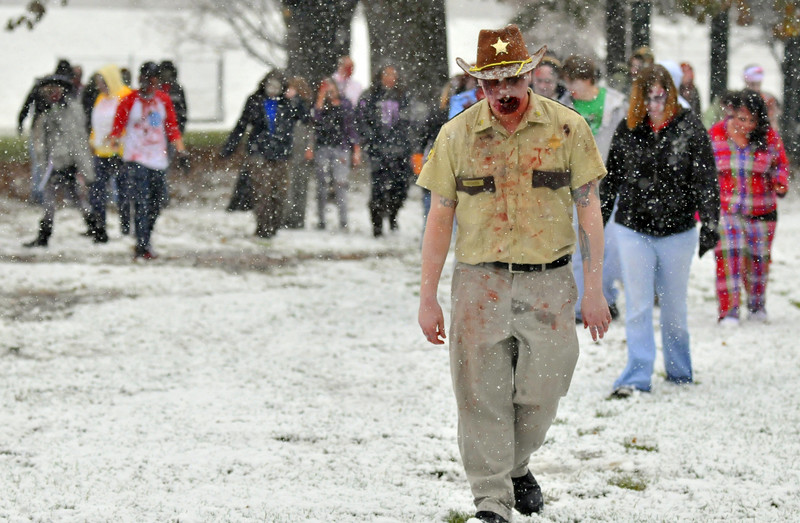 A large group of people dressed as Zombies participated in the 2nd annual zombie walk from Kirby Park to Wilkes-Barres Public Square and back in the snow on Saturday. 10/25/20111 Aimee Dilger/The Times Leader