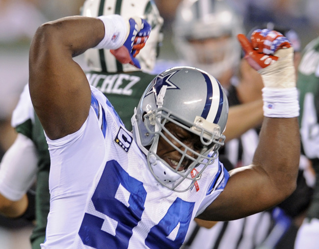 Dallas Cowboys linebacker DeMarcus Ware celebrates a sack during the first half of a game against the New York Jets on Sept. 11, 2011.