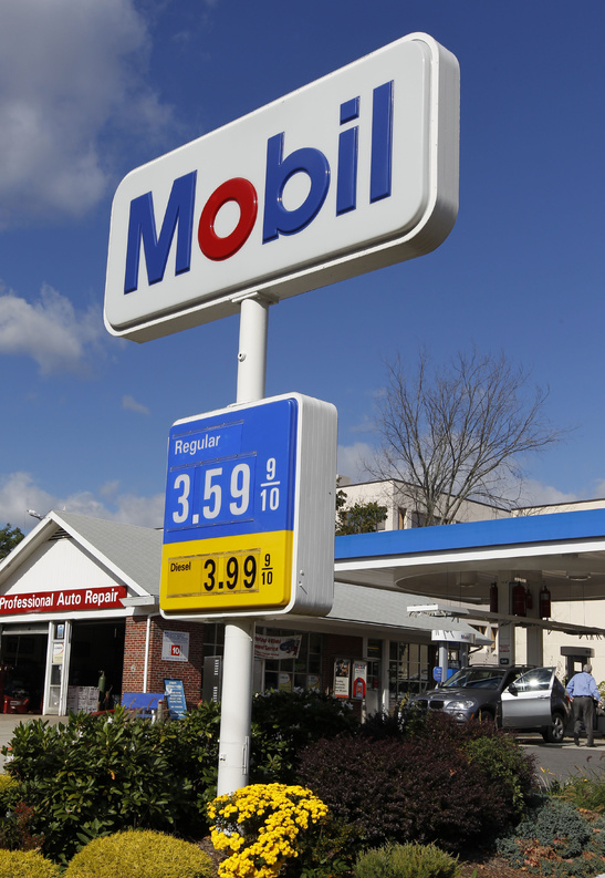 Gas prices are displayed at a Mobil station in Quincy, Mass. Analysts say oil demand may outstrip supply but don’t yet fear a price jump like the $147 per barrel crisis in 2008.