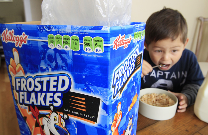 Nathaniel Donaker, 4, eats Kellogg's Frosted Flakes cereal at his home in Palo Alto, Calif.