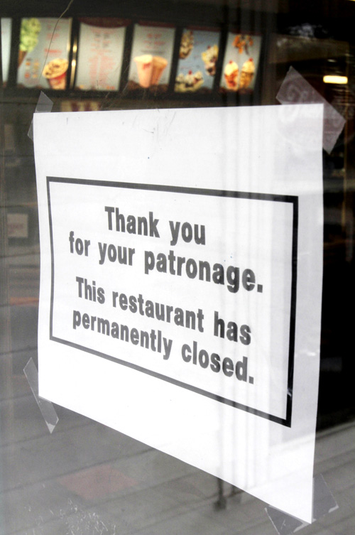 A closed sign is taped to the door of the Friendly's restaurant in Freeport today.