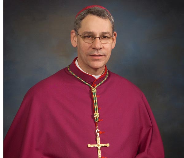 A 2004 photo provided by the Archdiocese of Kansas City and St. Joseph, Mo., shows the Rev. Monsignor Robert Finn, who is facing a criminal charge for not telling police about child pornography that was found on a priest's computer.